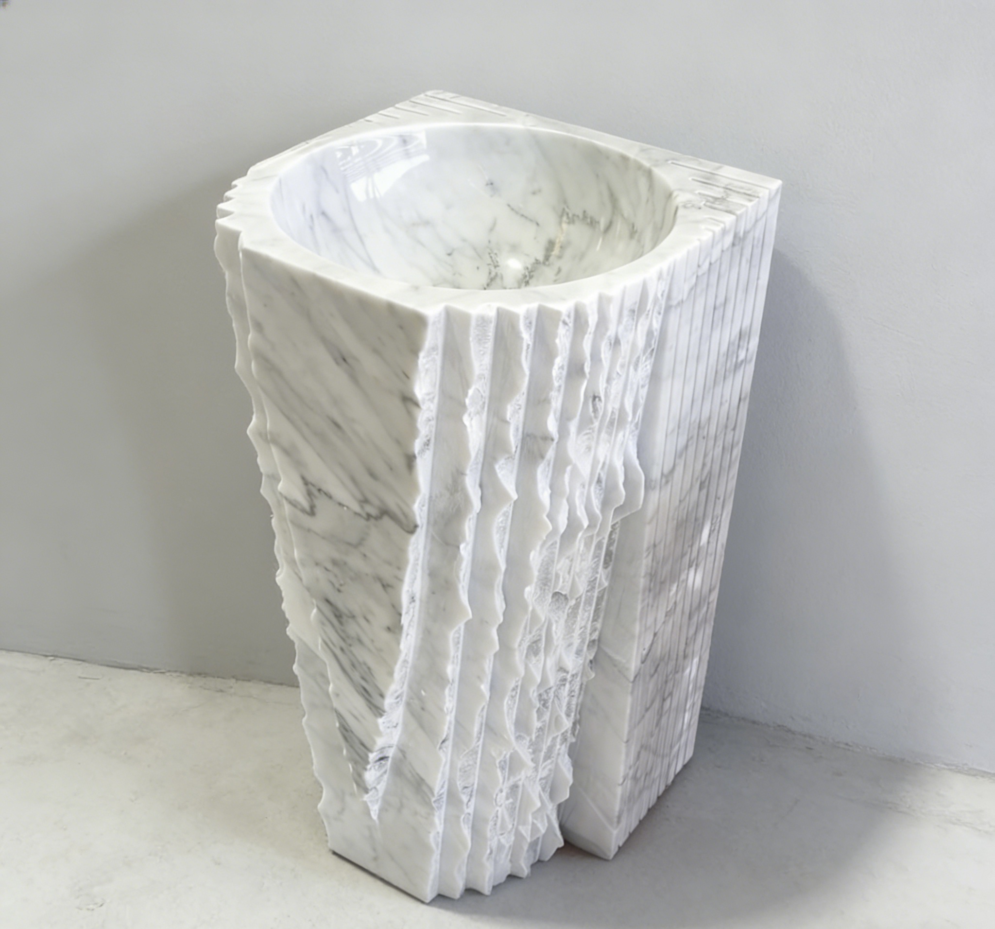 Calacatta marble pedestal sink